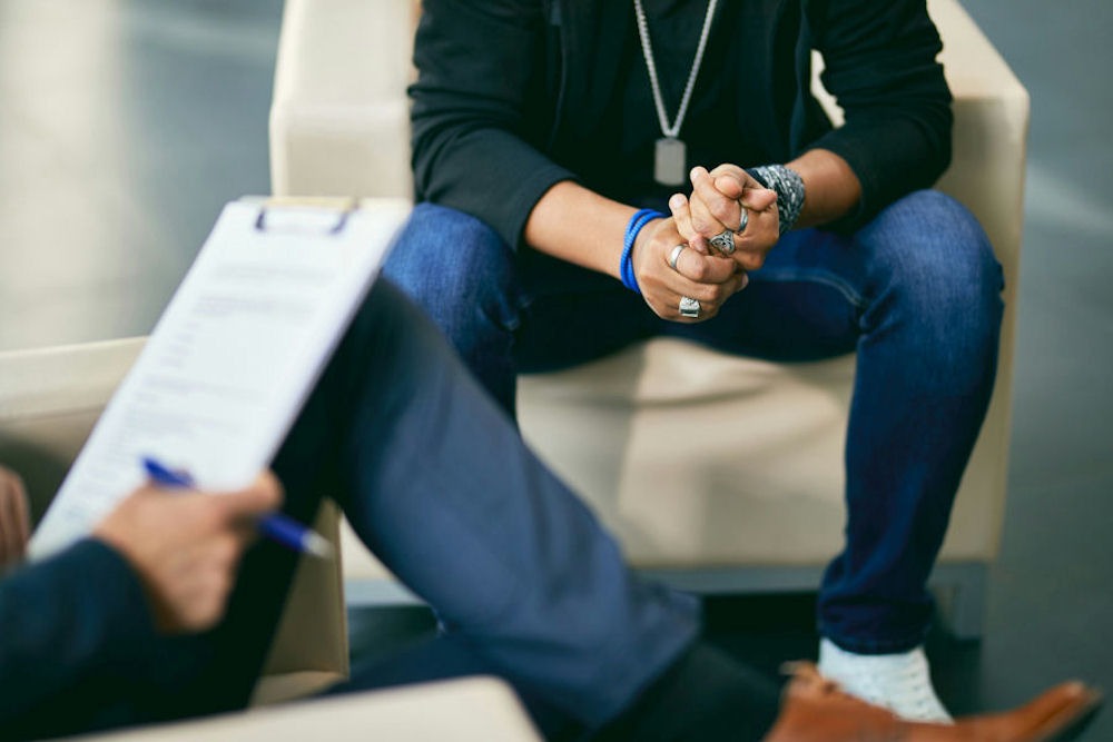 a man with cocaine addiction sitting during therapy